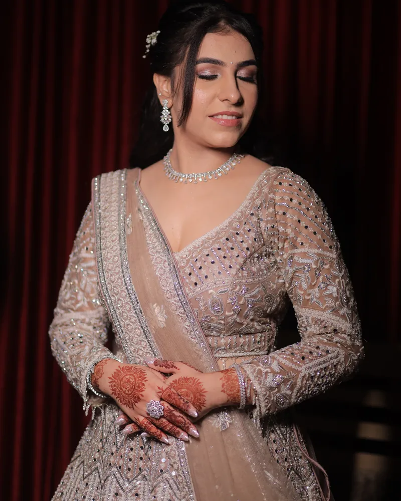 Bride in a silver lehenga